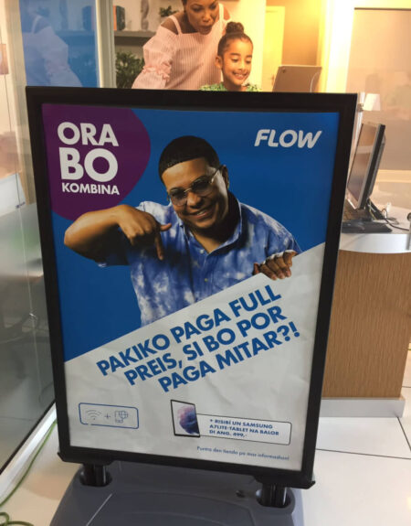 Instore reclamebord voor Flow
